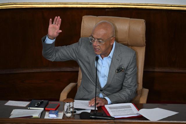 The President of the National Assembly of Venezuela Jorge Rodriguez leads the debate on the Bill for the Partial Reform of the Organic Law on Hydrocarbons during a session at the National Assembly in Caracas on January 29, 2026. (Photo by Federico PARRA / AFP)