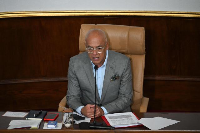 The President of the National Assembly of Venezuela Jorge Rodriguez leads the debate on the Bill for the Partial Reform of the Organic Law on Hydrocarbons during a session at the National Assembly in Caracas on January 29, 2026. (Photo by Federico PARRA / AFP)