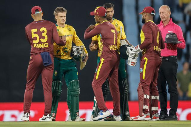 South African players are congratulated by West Indies players after South Africa won the second Twenty20 international cricket match between South Africa and West Indies at SuperSport Park in Centurion on January 29, 2026. (Photo by PHILL MAGAKOE / AFP)