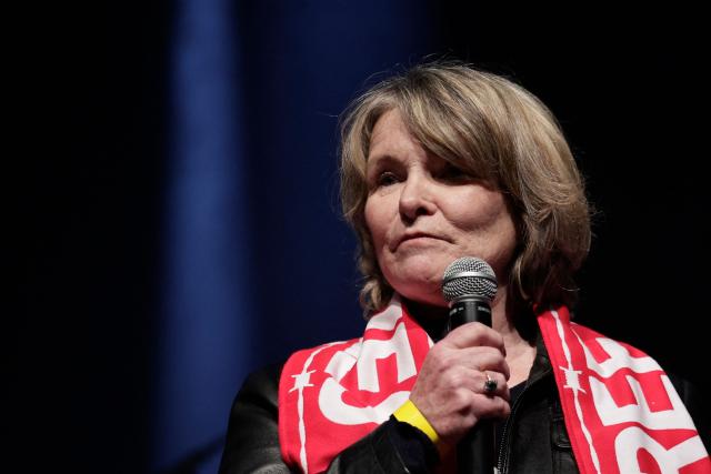 Mother of jailed French journalist Christophe Gleizes, Sylvie Godard delivers a speech during a Reporters Without Borders (RSF) evening in solidarity with jailed French sport journalist Christophe Gleizes at Bataclan music hall in Paris on January 29, 2026. Gleizes was arrested in May 2024 while travelling to northeastern Algeria's Kabylia region to write about the country's most decorated football club, Jeunesse Sportive de Kabylie. (Photo by STEPHANE DE SAKUTIN / AFP)