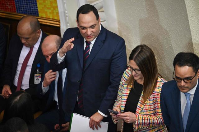 The president of Venezuelan state oil company PDVSA, Hector Obregon (C) attends the debate on the Bill for the Partial Reform of the Organic Law on Hydrocarbons during a session at the National Assembly in Caracas on January 29, 2026. (Photo by Federico PARRA / AFP)