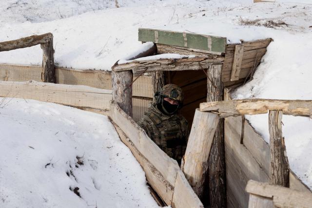 A Ukrainian serviceman of the 18th Sloviansk Brigade of the National Guard of Ukraine poses for photo during training at an undisclosed location in Donetsk region on January 28, 2026, amid the Russian invasion of Ukraine. (Photo by Tetiana DZHAFAROVA / AFP)