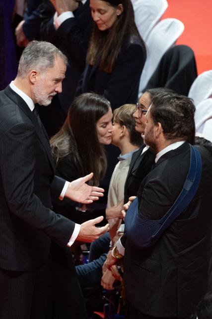 Spain's King Felipe VI and Queen Letizia meet victims' relatives during a funeral mass for the victims of the trains accident who killed 45 persons in Adamuz, on January 29, 2026, in Huelva. The January 18 accident near the southern village of Adamuz - one of Europe's deadliest rail disasters this century - has raised questions about the country's rail safety. (Photo by JORGE GUERRERO / AFP)