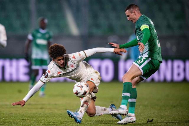 Ludogorets Razgrad's Bulgarian defender #03 Anton Nedyalkov (R)  fights for the ball with Nice's French midfielder #41 Everton Pereira during the  UEFA Europa League - League phase, Matchday 8 - football match between PFK Ludogorets Razgrad and OGC Nice at the Huvepharma Arena in Razgrad on January 29, 2026. (Photo by Nikolay DOYCHINOV / AFP)