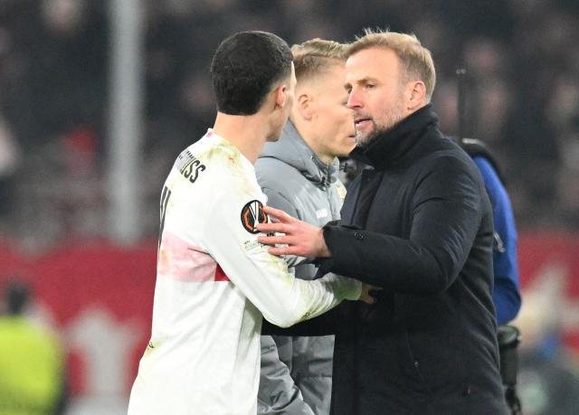 Stuttgart's German head coach Sebastian Hoeness (R) talks to Stuttgart's German-Marrocan forward #11 Bilal El Khannouss after the UEFA Europa League Group first round day 8 football match between VfB Stuttgart and Young Boys in Stuttgart, on January 29, 2026. (Photo by THOMAS KIENZLE / AFP)
