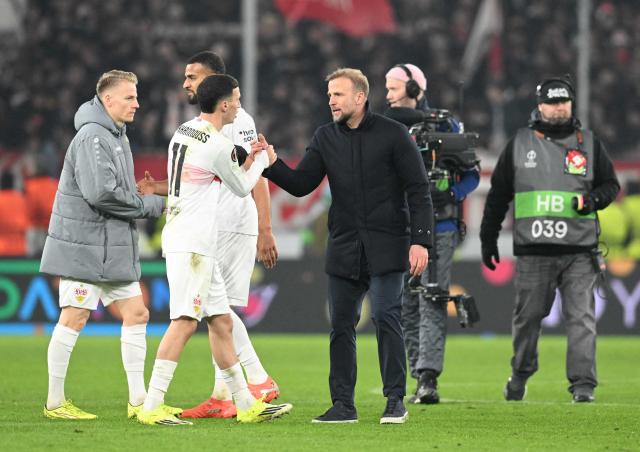 Stuttgart's German head coach Sebastian Hoeness (R) talks to Stuttgart's German-Marrocan forward #11 Bilal El Khannouss after the UEFA Europa League Group first round day 8 football match between VfB Stuttgart and Young Boys in Stuttgart, on January 29, 2026. (Photo by THOMAS KIENZLE / AFP)