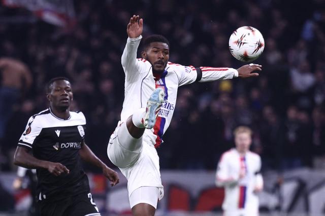 Lyon's English midfielder #98 Ainsley Maitland-Niles (C) controls the ball during the UEFA Europa League - League phase, Matchday 8 - football match between Olympique Lyonnais (OL) and PAOK FC at the Groupama Stadium in Lyon, central-eastern France, on January 29, 2026. (Photo by Alex MARTIN / AFP)