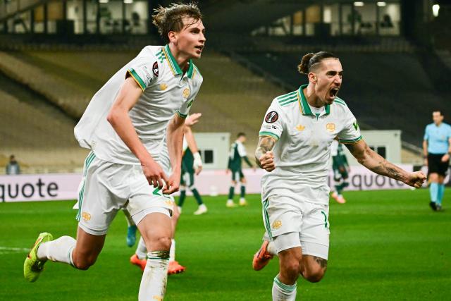 Roma's polish defender #24 Jan Ziolkowski (L) celebrates scoring his team's first goal during the UEFA Europa League - League phase, Matchday 8 - football match between Panathinaikos FC and AS Roma at the Olympic Stadium in Athens on January 29, 2026. (Photo by Aggelos NAKKAS / AFP)