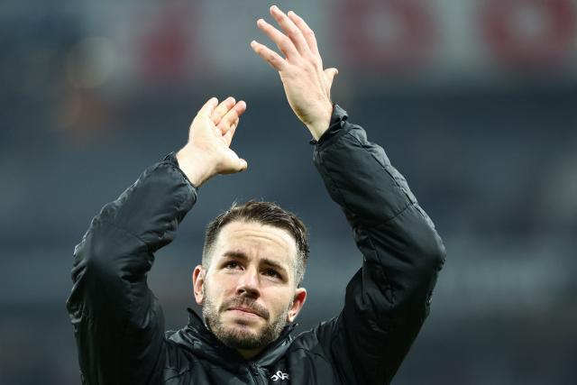 SC Freiburg's German defender #30 Christian Gunter acknowledges supporters at the end of during the UEFA Europa League - League phase, Matchday 8 - football match between LOSC Lille and SC Freiburg at the Pierre Mauroy Stadium in Villeneuve d'Ascq, northern France, on January 29, 2026. (Photo by Sameer Al-DOUMY / AFP)