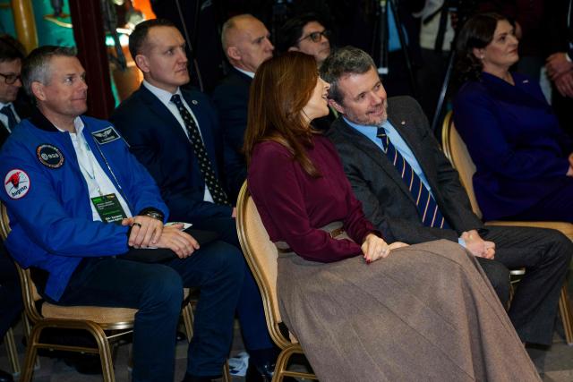Queen Mary of Denmark (3R) and King Frederik X of Denmark (2R) talk next to Danish ESA Astronaut Andreas Mogensen (L) during the opening of a Danish-Lithuanian business forum focusing on energy, defense, and security at the Energy and Technology Museum in Vilnius, Lithuania, on January 29, 2026. The Danish royal couple is on a state visit to Lithuania from January 28 to 29, 2026. His Majesty the King will travel to Greenland from February 18 to 20, 2026, the court announced. (Photo by Ida Marie Odgaard / Ritzau Scanpix / AFP) / Denmark OUT