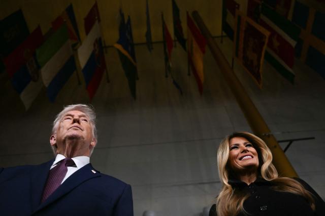 US President Donald Trump and US First Lady Melania Trump speak to journalists as attend the world premiere of Amazon MGM Studios' "Melania" at the Kennedy Center in Washington, DC, on January 29, 2026. (Photo by Brendan SMIALOWSKI / AFP)