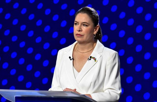 Costa Rica's presidential candidate of the Citizen Agenda Coalition and former first lady, Claudia Dobles, gestures during the final presidential debate at Canal 7 television studios in San Jose on January 29, 2026. Costa Rica will hold a presidential election on February 1, 2026. (Photo by Ezequiel BECERRA / AFP)