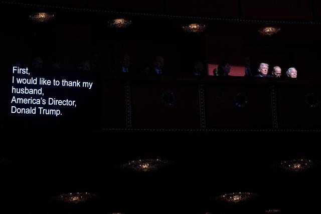 The telepromter shows the words being read by US First Lady Melania Trump (out of frame) as US President Donald Trump (L) and guests attend the world premiere of Amazon MGM Studios' "Melania" at the Kennedy Center in Washington, DC, on January 29, 2026. (Photo by Brendan Smialowski / AFP)