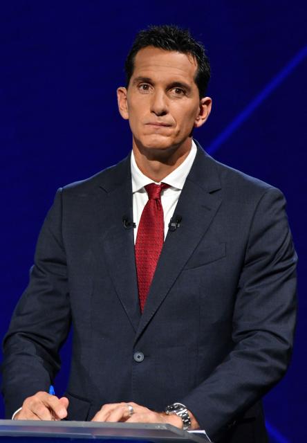 Costa Rica's Presidential candidate of the Avanza Party, Jose Miguel Aguilar Berrocal, gestures before the final presidential debate at Canal 7 television studios in San Jose on January 29, 2026. Costa Rica will hold a presidential election on February 1, 2026. (Photo by Ezequiel BECERRA / AFP)
