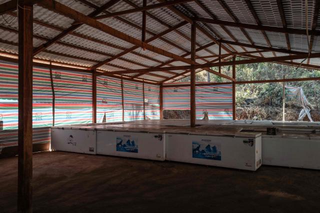 In this photo taken on January 24, 2026, freezers are seen during a press tour of a drug production site southwest of Mongyai, northern Shan State, that was captured by the Myanmar military. The Southeast Asian country has long been a hive for illegal drug trade, but analysts say the civil war triggered by a 2021 military coup has increased production and trafficking. (Photo by ANTHONY WALLACE / AFP)