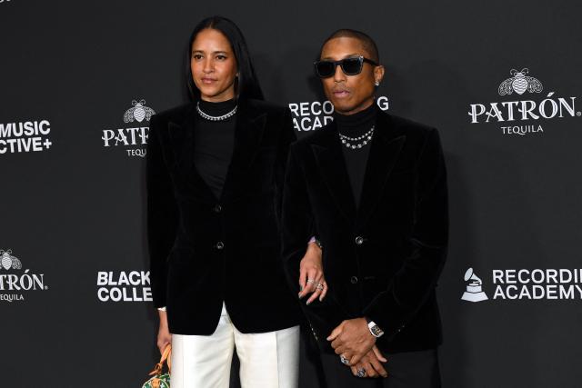US musician and record producer Pharrell Williams (R) and his wife model Helen Lasichanh attend the Recording Academy Honors Black Music Collective at the Fairmont Century Plaza in Los Angeles on January 29, 2026. (Photo by Unique Nicole / AFP)