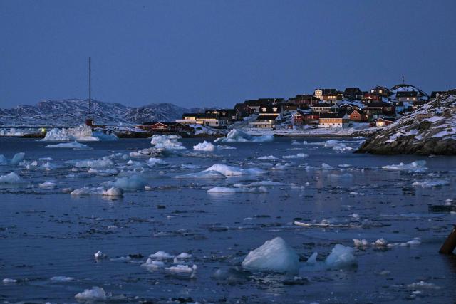 Ice floes are seen floating on the sea at the coastline of Nuuk, Greenland, on January 29, 2026. (Photo by Ina FASSBENDER / AFP)