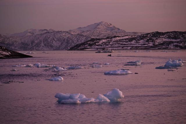 Ice floes are seen floating on the sea at the coastline of Nuuk, Greenland, on January 29, 2026. (Photo by Ina FASSBENDER / AFP)