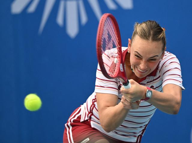 Donna Vekic of Croatia hits a return against Tatiana Prozorova of Russia during the semi-finals of women's singles at the Philippine Women's Open tennis tournament in Manila on January 30, 2026. (Photo by Ted ALJIBE / AFP)