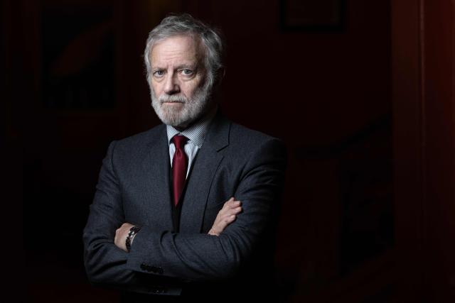 French actor Francis Huster poses during a photo session at the Theatre Antoine in Paris on January 28, 2026. He hopes to keep performing "for the next ten years": at 78, Francis Huster is returning to the stage as the therapist in the play "En Therapie", a theatrical adaptation of the eponymous series, delighted to refresh his craft alongside the younger generation. (Photo by Joel Saget / AFP)
