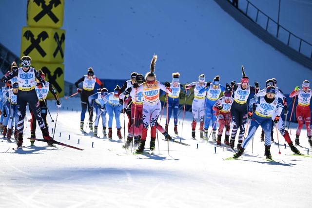 Athletes compete at the start of the first run of women's Normal Hill Mass Start event at the FIS Ski Nordic Combined World Cup, on January 30, 2026 in Seefeld, Austria. (Photo by BARBARA GINDL / APA / AFP) / Austria OUT