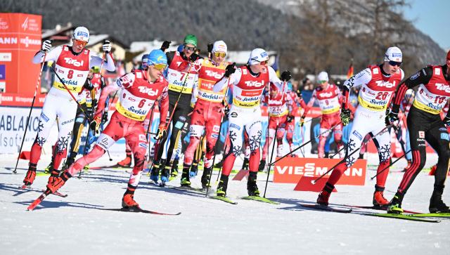 Athletes compete during the first run of men's Normal Hill Mass Start event at the FIS Ski Nordic Combined World Cup, on January 30, 2026 in Seefeld, Austria. (Photo by BARBARA GINDL / APA / AFP) / Austria OUT