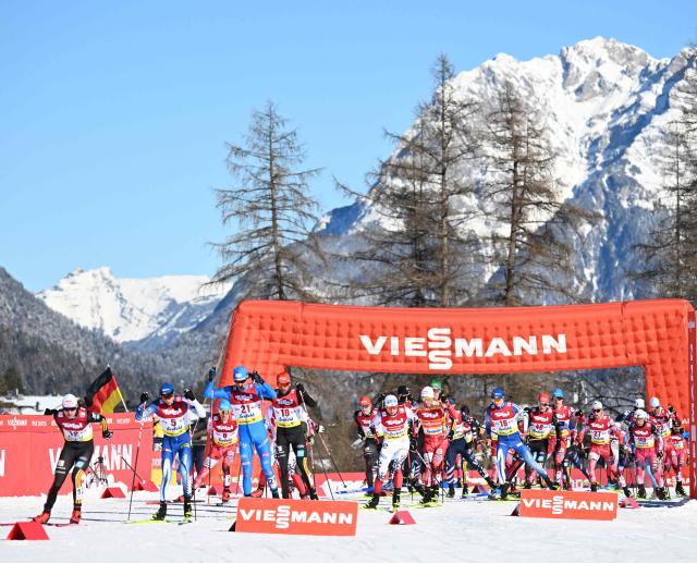 Athletes compete during the first run of men's Normal Hill Mass Start event at the FIS Ski Nordic Combined World Cup, on January 30, 2026 in Seefeld, Austria. (Photo by BARBARA GINDL / APA / AFP) / Austria OUT