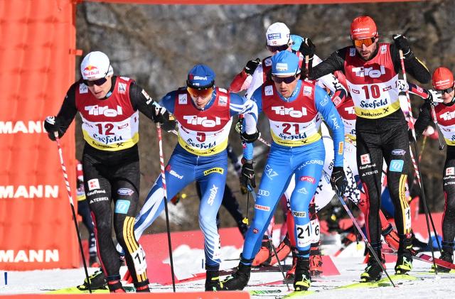 (L-R) Germany's Vinzenz Geiger, Finland's Ilkka Herola, Italy's Samuel Costa and Germany's Johannes Rydzek compete during the first run of men's Normal Hill Mass Start event at the FIS Ski Nordic Combined World Cup, on January 30, 2026 in Seefeld, Austria. (Photo by BARBARA GINDL / APA / AFP) / Austria OUT
