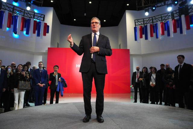 Britain's Prime Minister Keir Starmer addresses Chinese and UK business delegations at House of UK reception in Shanghai on January 30, 2026. (Photo by Carl Court / POOL / AFP)