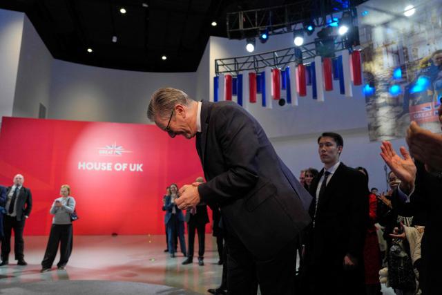 Britain's Prime Minister Keir Starmer visits the House of UK reception in Shanghai on January 30, 2026. (Photo by Kin Cheung / POOL / AFP)