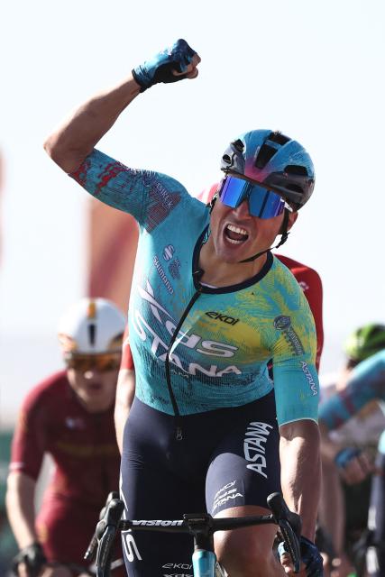 XDS Astana Team Italian Matteo Malucelli celebrates as he crosses the finish ligne to winn the fourth stage of the AlUla Tour cycling race, 173,4 km from Winter Park to Hegra on January 30, 2026. (Photo by Anne-Christine POUJOULAT / AFP)