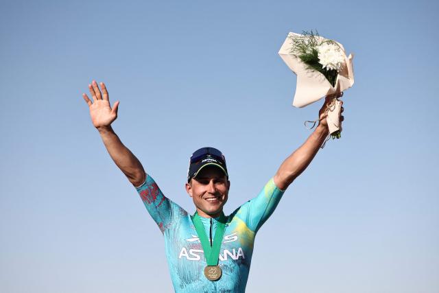 XDS Astana Team italian Matteo Malucelli celebrates on the podium after winning the fourth stage of the AlUla Tour cycling race, 173,4 km from Winter Park to Hegra on January 30, 2026. (Photo by Anne-Christine POUJOULAT / AFP)