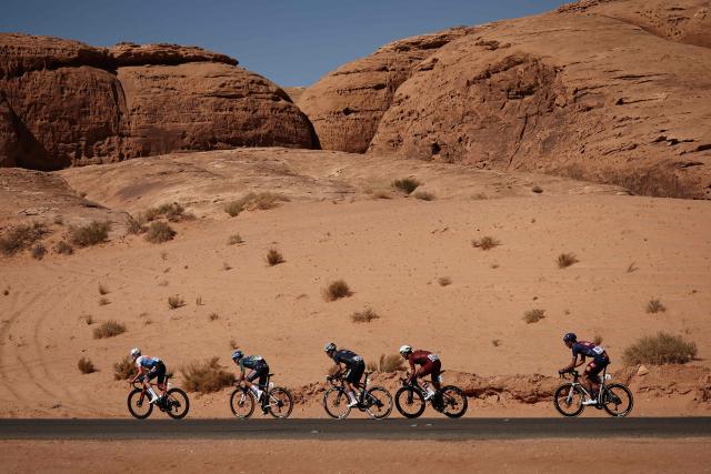Riders competes in the fourth stage of the AlUla Tour cycling race, 173,4 km from Winter Park to Hegra on January 30, 2026. (Photo by Anne-Christine POUJOULAT / AFP)