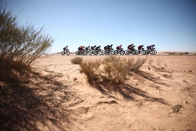 The breakaway competes in the fourth stage of the AlUla Tour cycling race, 173,4 km from Winter Park to Hegra on January 30, 2026. (Photo by Anne-Christine POUJOULAT / AFP)