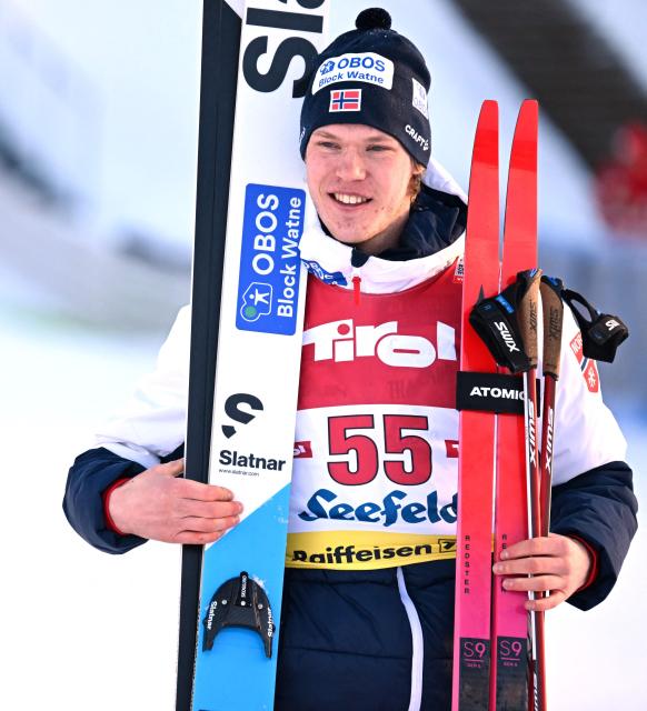 Norway's Andreas Skoglund celebrates on the podium after winning third place at the men's Normal Hill Mass Start event at the FIS Ski Nordic Combined World Cup, on January 30, 2026 in Seefeld, Austria. (Photo by BARBARA GINDL / APA / AFP) / Austria OUT