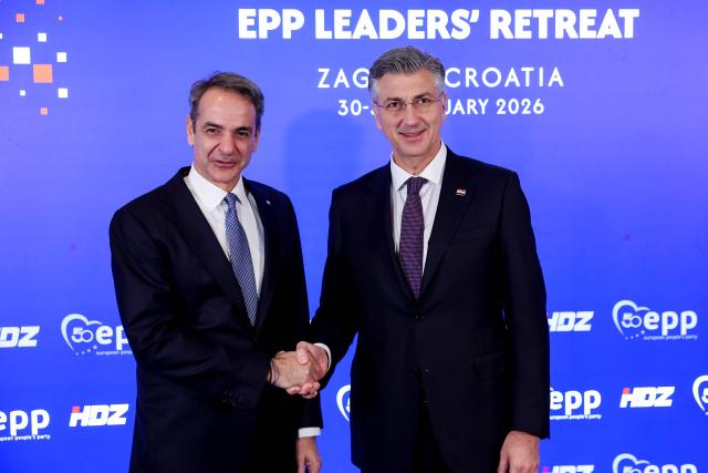 Croatian Prime Minister Andrej Plenkovic (R) and Greece Prime Minister Kyriakos Mitsotakis (L) during a two-day informal meeting of leaders of the European People’s Party (EPP), Europe’s largest political group, in Zagreb, on January 30, 2026. (Photo by MARKO PERKOV / AFP)