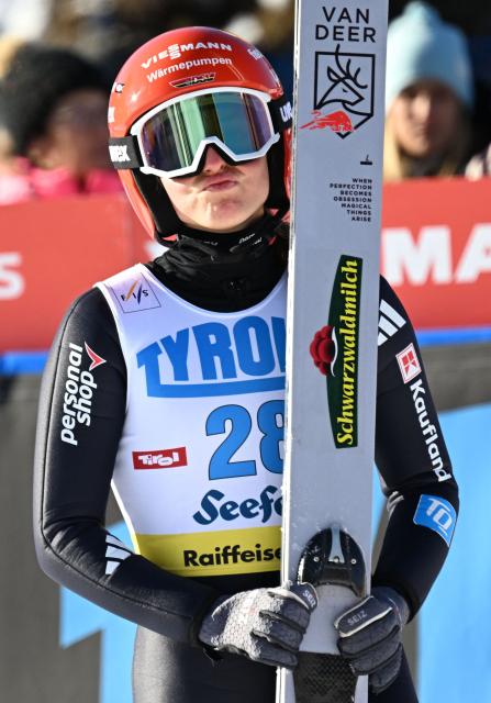 Germany's Nathalie Armbruster reacts after competing in the women's Normal Hill Mass Start 5km event at the FIS Ski Nordic Combined World Cup, on January 30, 2026 in Seefeld, Austria. (Photo by BARBARA GINDL / APA / AFP) / Austria OUT