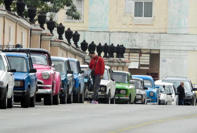 Cars wait in line to refuel at a gas station in Havana on January 30, 2026. Cuban President Miguel Diaz-Canel on January 30, 2026, denounced US President Donald Trump’s attempt to “asphyxiate” the communist island’s economy under a “false pretext.” (Photo by Adalberto ROQUE / AFP)