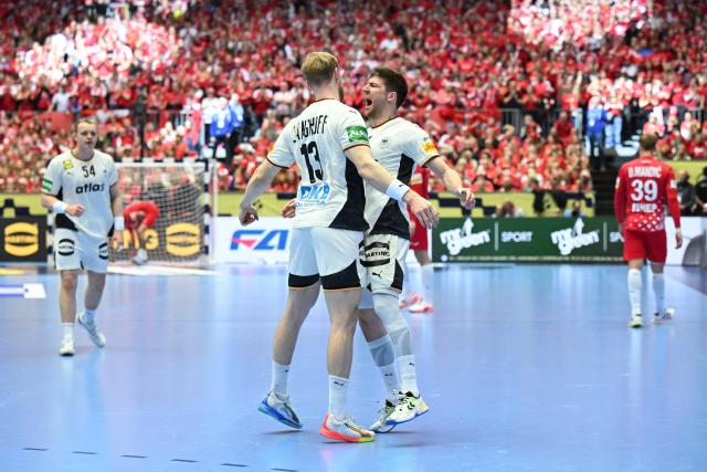 Germany's left back #13 Matthes Langhoff and Germany's right winger #17 Lukas Zerbe vie for the ball during the men's EHF Euro 2026 semi-finals handball match Germany vs Croatia in Herning, Denmark, on January 30, 2026. (Photo by Jonathan Nackstrand / AFP)