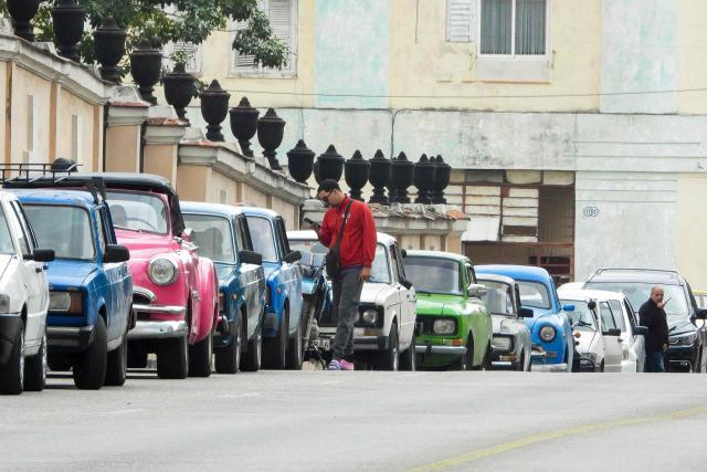 Vehicles wait in line to refuel at a gas station in Havana on January 30, 2026. Cuban President Miguel Diaz-Canel on January 30, 2026, denounced US President Donald Trump’s attempt to “asphyxiate” the communist island’s economy under a “false pretext.” (Photo by ADALBERTO ROQUE / AFP)