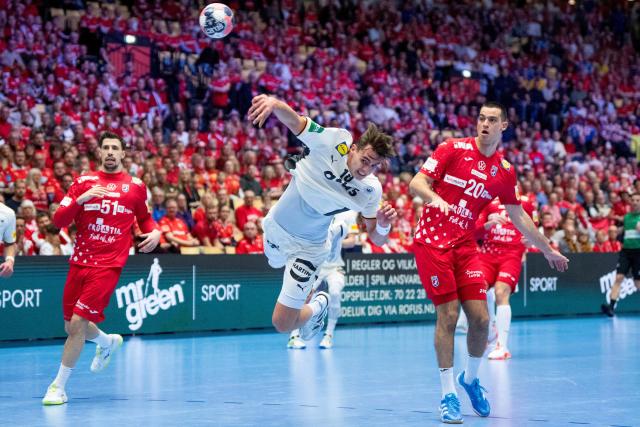 Germany's left back #18 Julian Koster shoots during the men's EHF Euro 2026 semi-finals handball match Germany vs Croatia in Herning, Denmark, on January 30, 2026. (Photo by Bo Amstrup / Ritzau Scanpix / AFP) / Denmark OUT