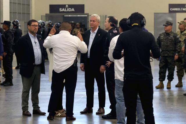 Chile's elected-president Jose Antonio Kast (C) visits the Counter-Terrorism Confinement Centre (CECOT) mega-prison, where hundreds of members of the MS-13 and 18 Street gangs are being held, in Tecoluca, El Salvador on January 29, 2026. The CECOT, the largest prison in Latin America and emblem of the war against gangs of the government of President Nayib Bukele, celebrates two years since it was inaugurated on February 1. (Photo by Oscar RIVERA / AFP)