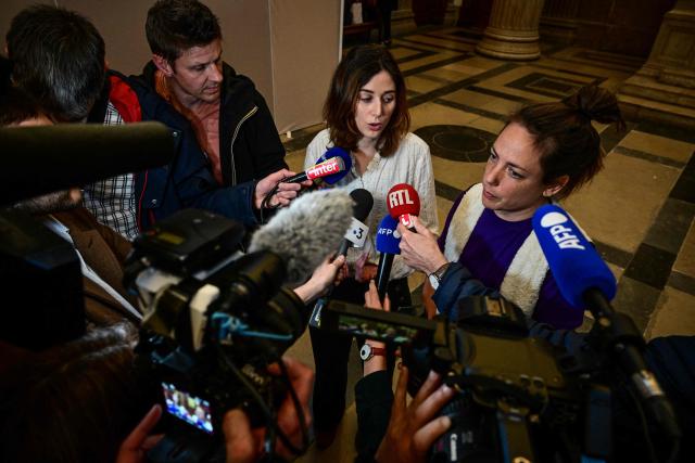(FILES) Lawers of the accused Myriam Jaouen, Mailys Leduc (L) and Julia Coppard talk to the press at the Assizes Court of Lyon on April 2, 2025, during the trial of a former employee of a Lyon micro-nursery centre of the "People and Baby" group accused of killing a infant by making it swallow a caustic chemical drain cleaning product. Myriam Jaouen was sentenced on appeal to 30 years' imprisonment on January 30, 2026 for killing a baby by administering a massive dose of acid-based household cleaning product. (Photo by OLIVIER CHASSIGNOLE / AFP)