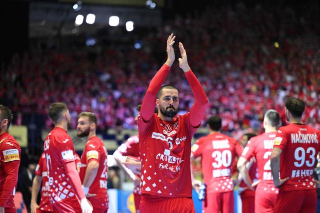 Croatia's right winger #06 Mario Sostaric cheers supporters after the men's EHF Euro 2026 semi-finals handball match Germany vs Croatia in Herning, Denmark, on January 30, 2026. (Photo by Jonathan Nackstrand / AFP) / Denmark OUT