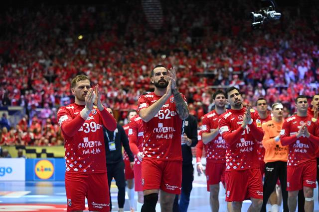 Croatia's players cheer their supporters after the men's EHF Euro 2026 semi-finals handball match Germany vs Croatia in Herning, Denmark, on January 30, 2026. (Photo by Jonathan Nackstrand / AFP) / Denmark OUT