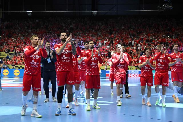 Croatia's players cheer their supporters after the men's EHF Euro 2026 semi-finals handball match Germany vs Croatia in Herning, Denmark, on January 30, 2026. (Photo by Jonathan Nackstrand / AFP) / Denmark OUT