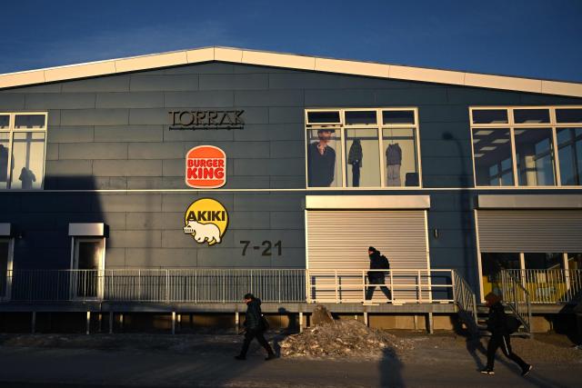 Pedestrians walks past a Big Mac restaurant at the city of Sisimiut, Greenland on January 30, 2026. (Photo by Ina FASSBENDER / AFP)
