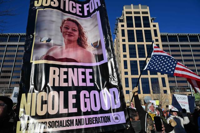 A banner demanding justice for Renee Nicole Good is displayed during a march against US Immigration and Customs Enforcement (ICE) in Minneapolis, Minnesota, on January 30, 2026. Donald Trump's border chief said January 29, 2026 that some federal agents could be withdrawn from Minneapolis, the northern US city that has become the flashpoint for the president's immigration crackdown. The Trump administration, facing a public backlash over the shooting deaths of two Americans by federal agents in Minneapolis, also eased immigration operations in the northeastern state of Maine. (Photo by ROBERTO SCHMIDT / AFP)