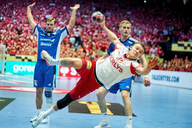 Denmark's Simon Pytlick (C) shoots during the men's EHF Euro 2026 semi-finals handball match Denmark vs Iceland in Herning, Denmark, on January 30, 2026. (Photo by Thomas Traasdahl / Ritzau Scanpix / AFP) / Denmark OUT