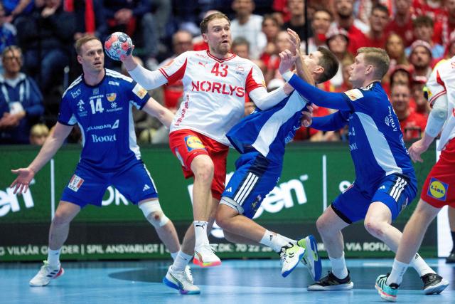 Denmark's Simon Pytlick (C) controls the ball during the men's EHF Euro 2026 semi-finals handball match Denmark vs Iceland in Herning, Denmark, on January 30, 2026. (Photo by Bo Amstrup / Ritzau Scanpix / AFP) / Denmark OUT